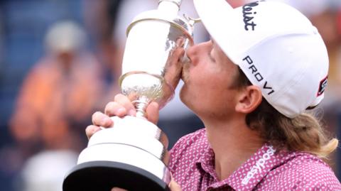 Cam Smith kisses the Claret Jug after winning the 150th Open Championship over the Old Course at St Andrews